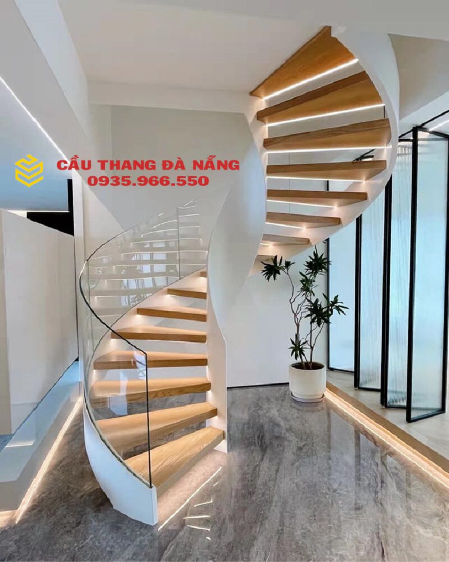 Cầu thang không trụ lan can kính dạng xoắn ốc làm điểm nhấn thẩm mỹ cho căn nhà của bạn,